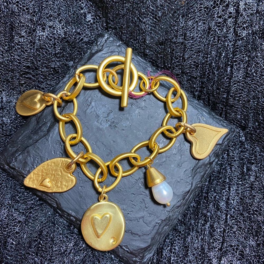 Ladies handmade charm bracelet, designed by Pulccino in Mexico.